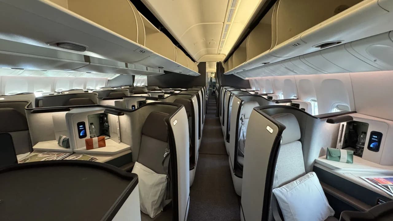 Cathay Pacific Aria Suite business class with sliding door and 24-inch 4K screen