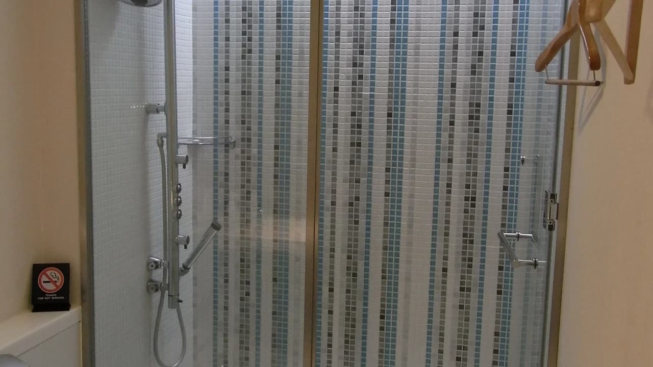 Airport arrival lounge private shower suite with luxury toiletries