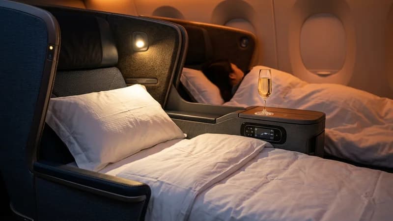 Business class lie-flat seat with bedding