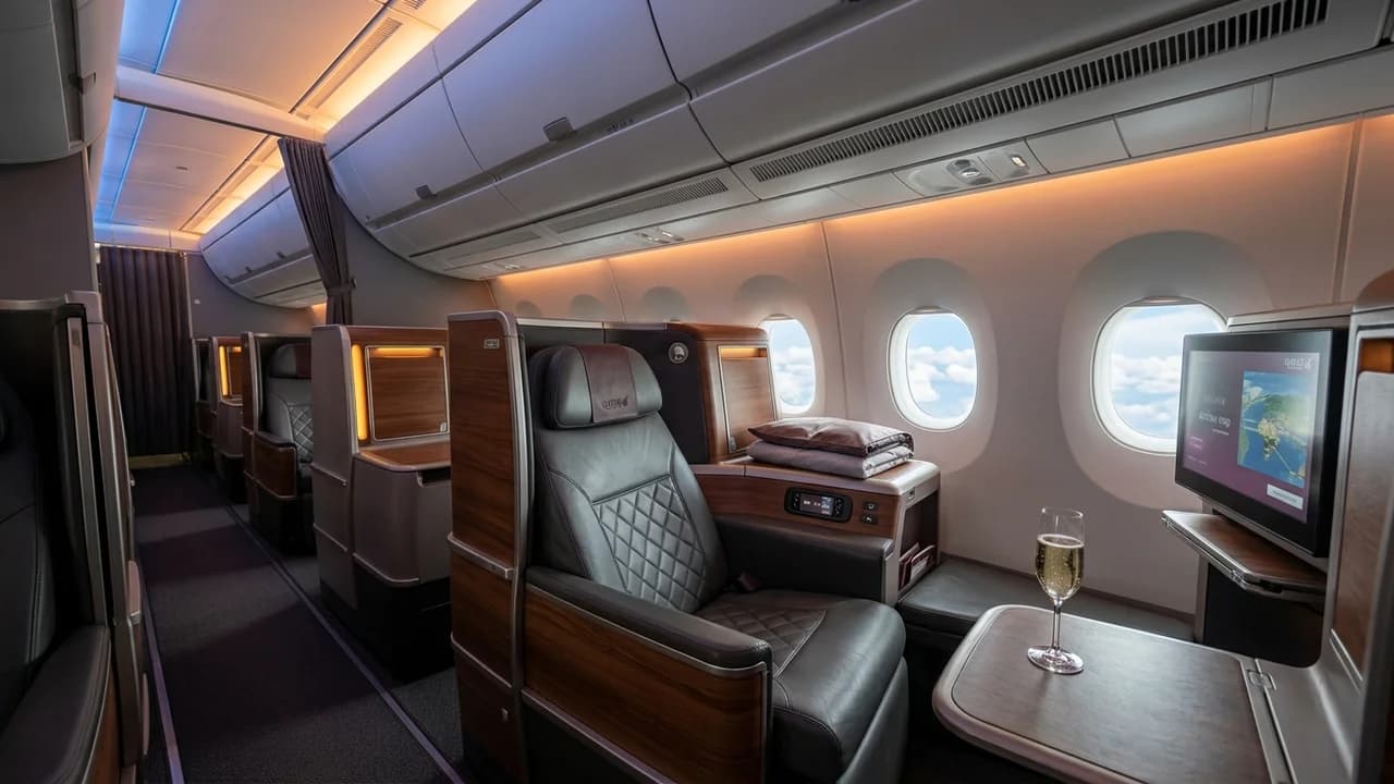 LOT Polish Airlines business class cabin with lie-flat suite and premium amenities