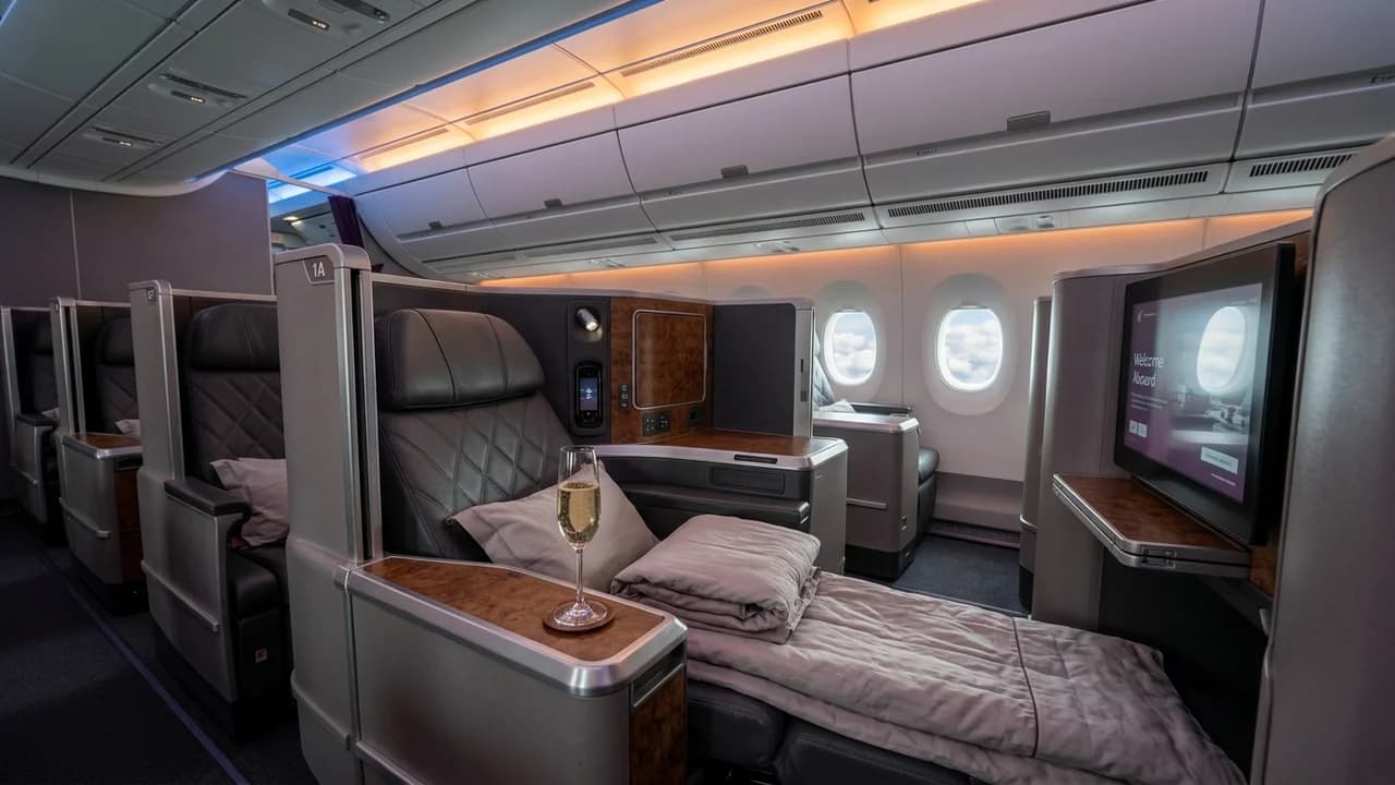 TAP Air Portugal business class cabin with lie-flat suite and premium amenities