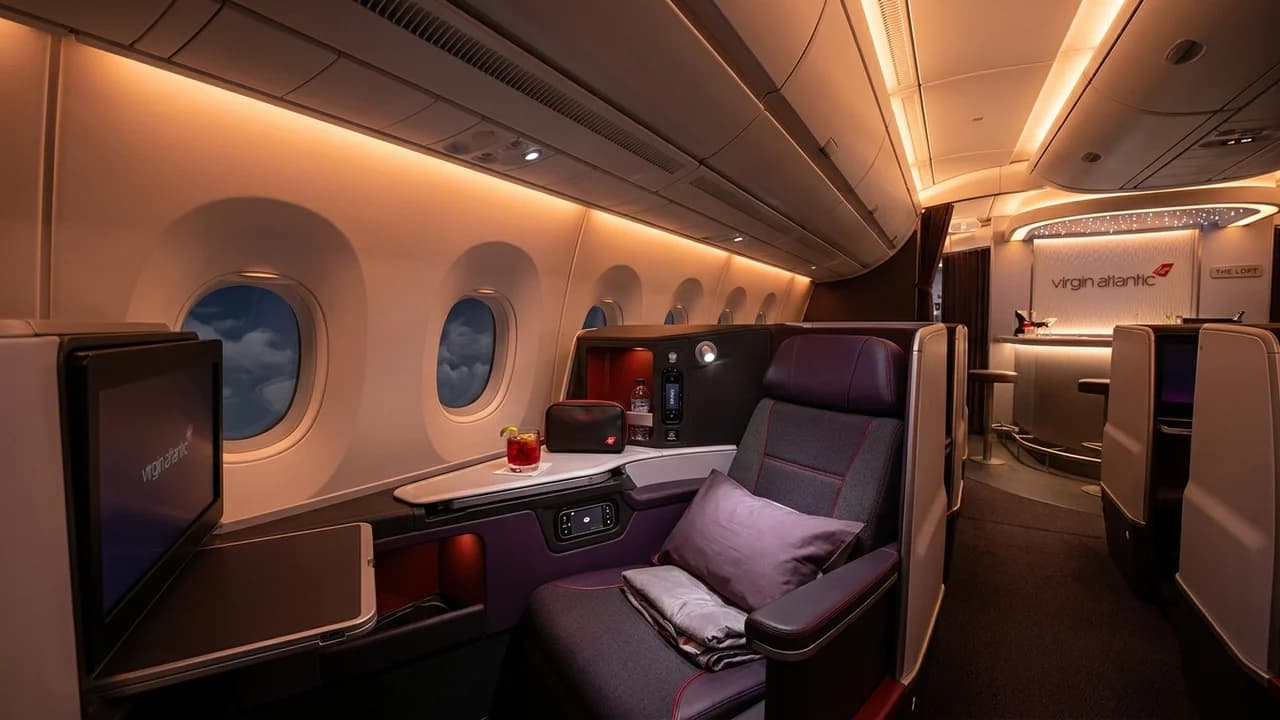 Virgin Atlantic business class cabin with lie-flat suite and premium amenities
