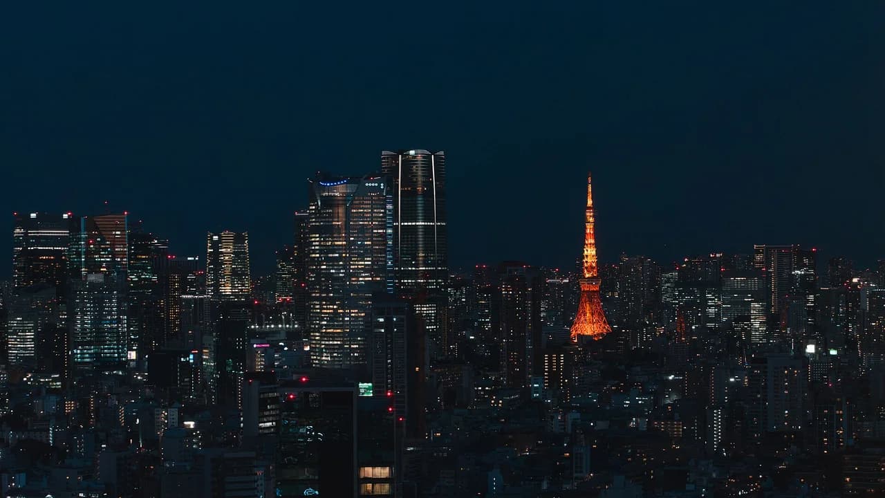 Tokyo skyline illuminated at night with Tokyo Tower