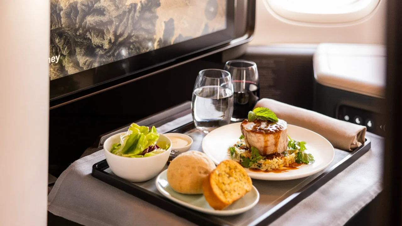 Cathay Pacific Business Class business class dining and meal service — In-flight service on the San Francisco–Hong Kong route