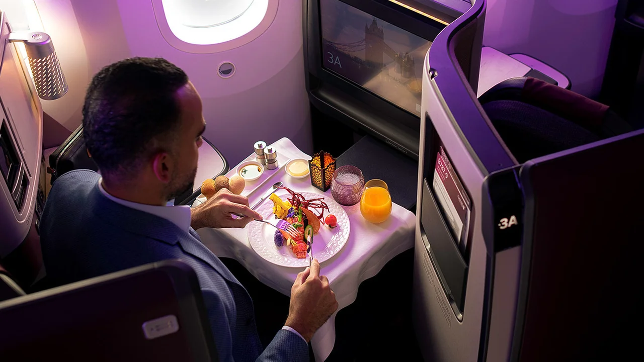 Qatar Airways Qsuite business class dining and meal service