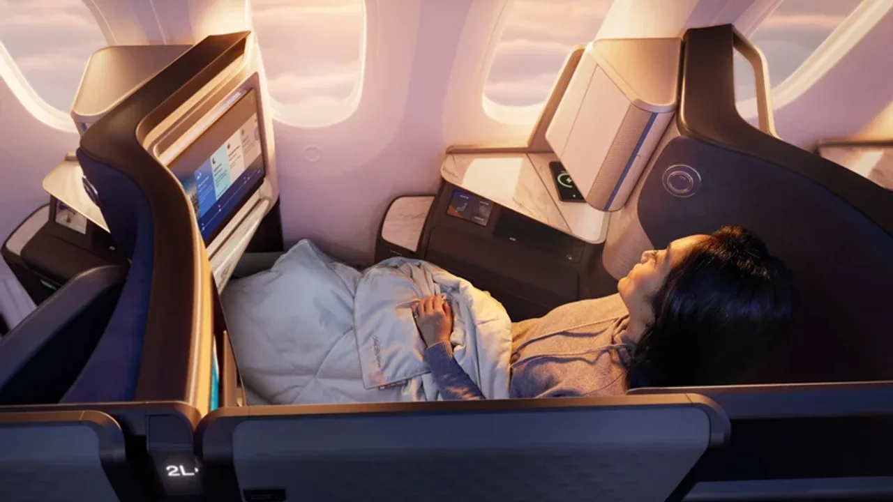 United business class seat — premium cabin on flights to Naples